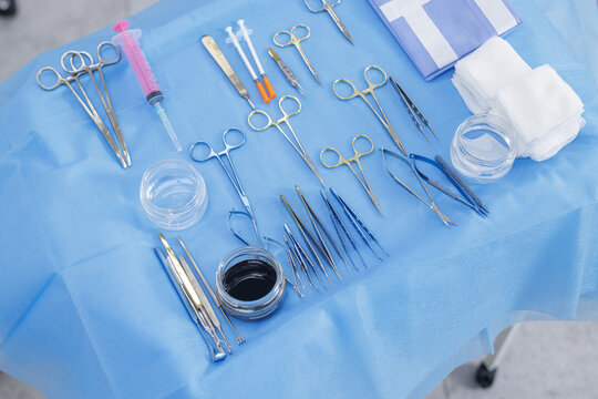 Oculoplastic and facial plastic surgery instruments on sterile blue drape