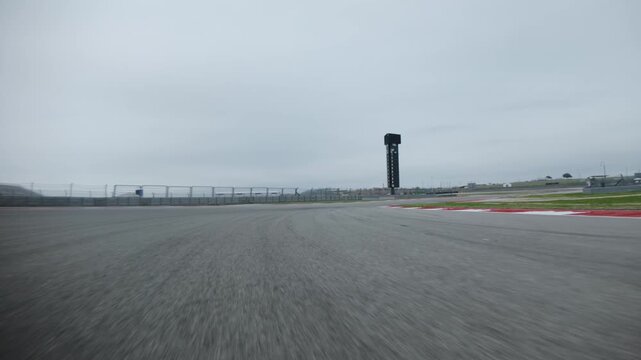 Low Angle POV Driving through Corners and Turns on Formula 1 Race Track