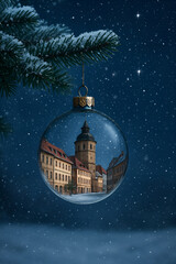 Fototapeta premium Weihnachtskugel mit winterlicher Stadtansicht