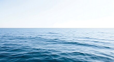 Obraz premium Vast Blue Ocean Under Clear Sky.