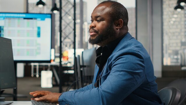 Close up of woman archivist rolling a trolley to transport documents and files, assisting the boss and coworkers with efficient workplace support. Storage of critical paperwork. Camera B.
