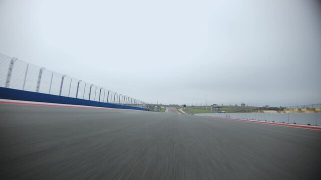 POV Low Angle Perspective Driving on Race Track