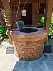 Rustic Brick Well in the Yard