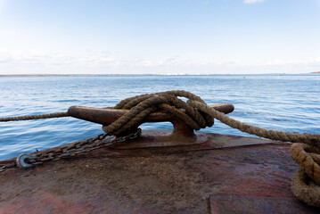rope around a cleat on a dock © Elemental Imagery 