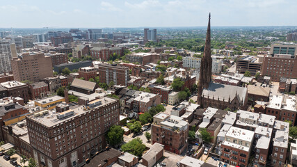 Morning sun shines on church and building architecture in the heart of the historic Mount Vernon...