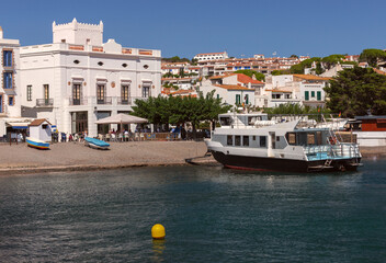 White building by the beach in Cadaques, Spain