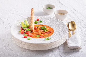 Elegant Thai soup as culinary artistry in top chef kitchen.