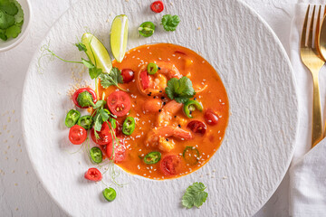 Exclusive Thai soup as culinary artistry on plate.