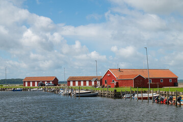 red buildings by the port in town of Nibe in Denmark