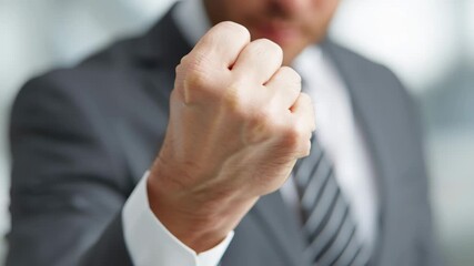 Man clenched fist business suit expressing determination and success confident gesture and energy confident businessman pointing - Powered by Adobe