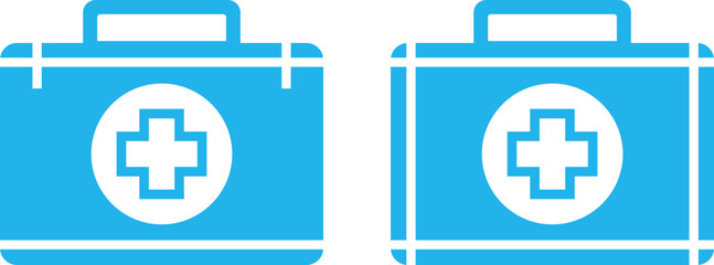 Obraz premium Two blue first aid kits with white cross symbol