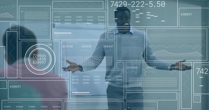 Gesturing African American man presenting digital data overlays in conference room, whiteboard