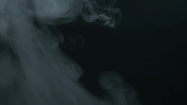 Ephemeral Vapor: Intricate patterns of ethereal vapor cascade and swirl against a muted backdrop, creating a dance of texture and form.