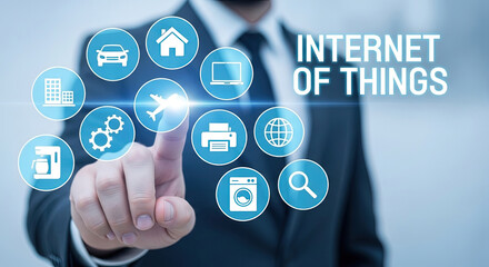 Internet of Things Concept: Businessman Touching IOT Icons on Screen, Smart Home, Car, and Devices Connectivity, Future Technology, Innovation
