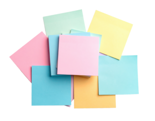 Stack of colorful sticky notes in various pastel shades, arranged on white.