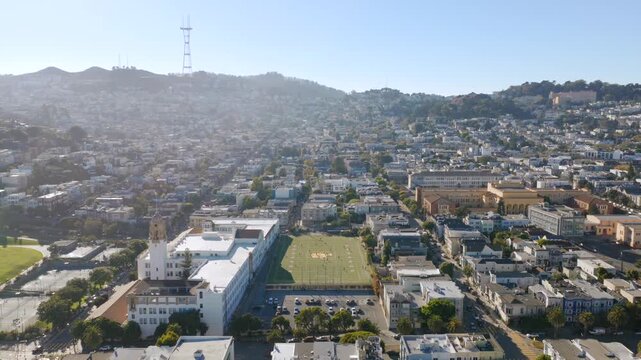 San Francisco - Aerial View of Mission High School with Kids on Football Field and Sutro Tower in Background