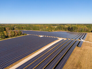 Sunny Daytime Aerial Drone Images of a Solar Farm in Zebulon, North Carolina: Technology,...