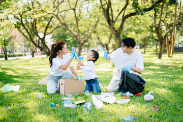 Joyful family volunteering to clean a park together. A heartwarming outdoor scene promoting teamwork, love, and environmental awareness in a green lifestyle.