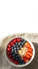 Top-Down Bright Flatlay of Oatmeal Bowl with Berries