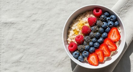 Top-Down Bright Flatlay of Oatmeal Bowl with Berries