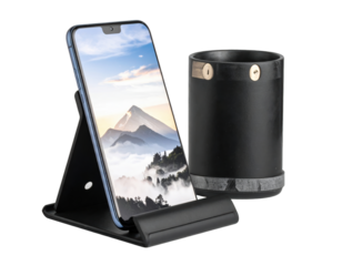 Smartphone on a stand next to a black container.