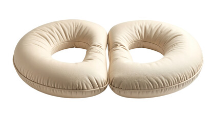 Twin beige donut pillows centered