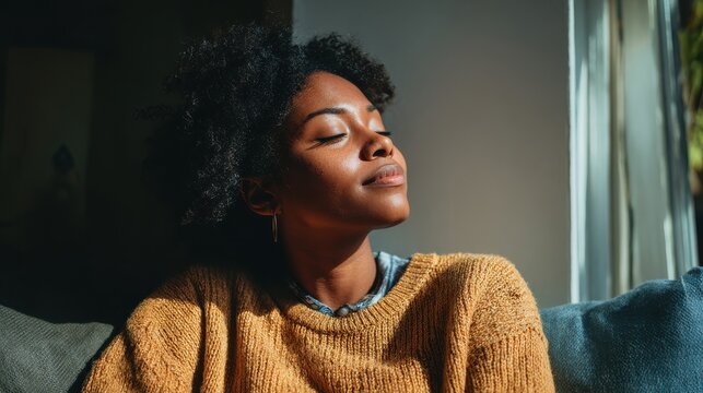 people rest comfort and leisure concept  happy african young woman relaxing or dreaming at home no logos no brands ar 169