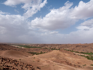 View of a small Berber village with a palm grove, Morocco