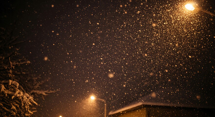 Snow falling from dark night sky. Winter weather background with snowfall and stars