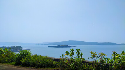 view of the janjira fort in the sea from dongari hill in maharashtra in india.