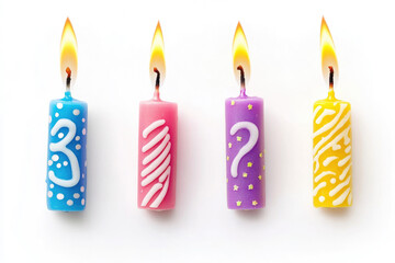 Four colorful lit birthday candles in a row celebrations party decorations isolated on white background