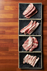 Raw meat from various parts on a plate