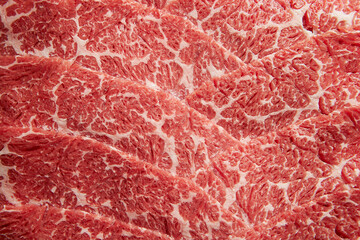 Obraz premium Sliced ​​frozen beef, uncooked food