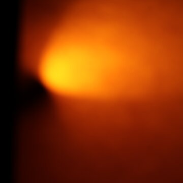 Una toma de cerca de un fondo abstracto de colores anaranjado, Amarillo, blanco y negro con un degradado ligero desenfocado