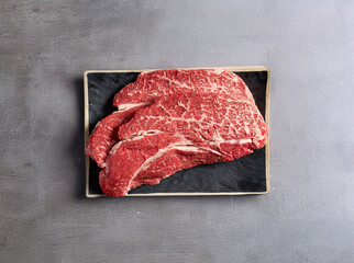 Fresh raw meat on a plate