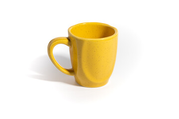 Vibrant yellow ceramic coffee mug with a speckled texture, isolated on a pure white background. Bright and cheerful drinkware for breakfast, cozy, or cafe themes.