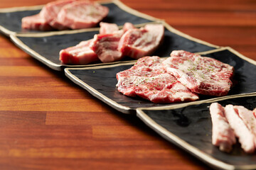 Raw meat from various parts on a plate
