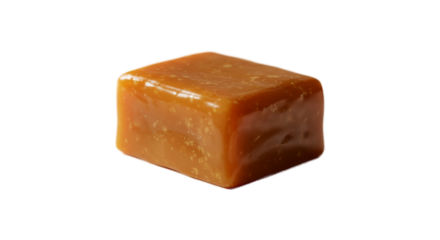 Close Up Of A Single Caramel Candy Cube With A Smooth Shiny Texture