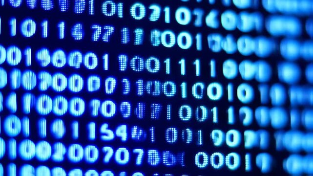 Close-up of a grid of blurred, glowing blue binary code digits