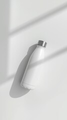 White stainless steel water bottle on clean background, minimalist eco thermos 