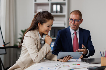 Two business talking at table in meeting room, discussing job tasks, teamwork in modern office workspace, sharing ideas for brainstorming. Stakeholders planning cooperation, marketing strategy
