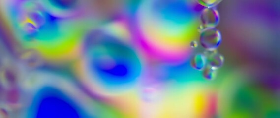 Abstract iridescent fluid dynamics with colorful gradient bubbles and shimmering reflections - Powered by Adobe