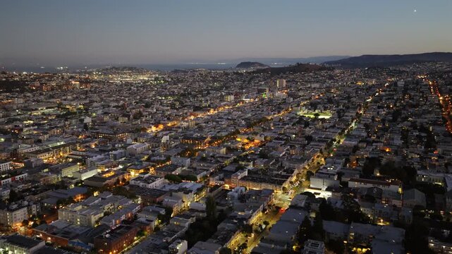 San Francisco - Aerial View of Mission District at Night / Blue Hour with Streets Glowing