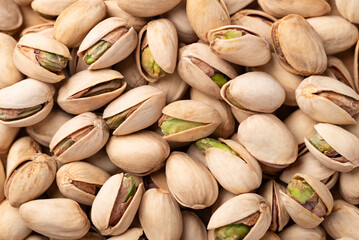 Fototapeta premium Roasted Pistachio nuts texture background
