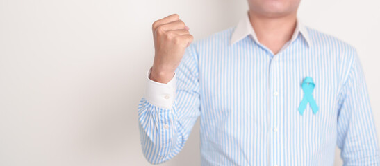 man with blue Ribbon for concept of blue November, November Prostate Cancer Awareness month, World...
