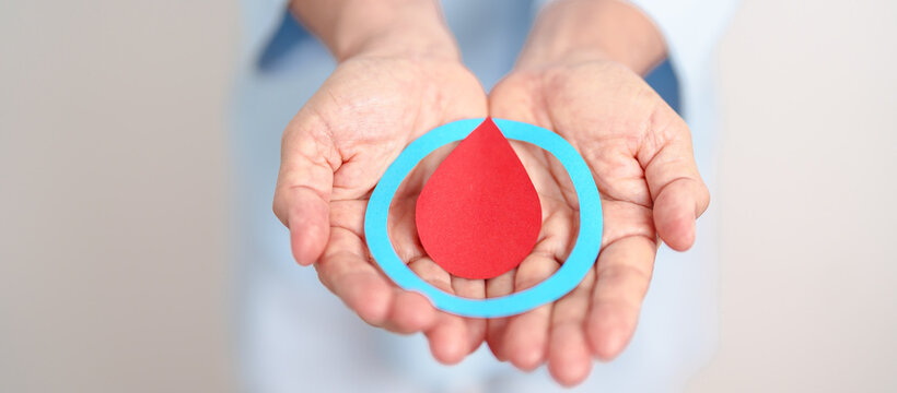 Elderly woman with Blue Circle and red Blood drop for World Diabetes Day, Blue November Health month, Diabetes awareness, Blood sugar check, Insulin, Glucose screening, donation and Health checkup - Powered by Adobe