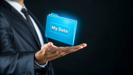 Male cradling blue digital folder labeled 'MY DATA', symbolizing personal data protection, privacy, and cybersecurity