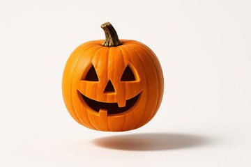 Fototapeta premium Halloween pumpkin floating above surface with faint shadow ellipse on white
