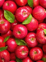 Vibrant Close-Up of Fresh Red Apples with Water Droplets and Green Leaves, Top-Down View, Studio Shot, Food Photography