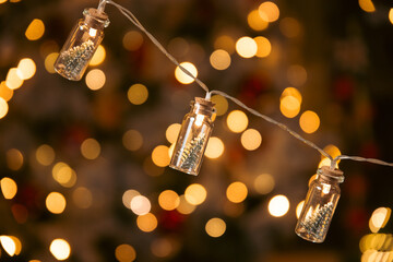 Christmas string lights with small bottles